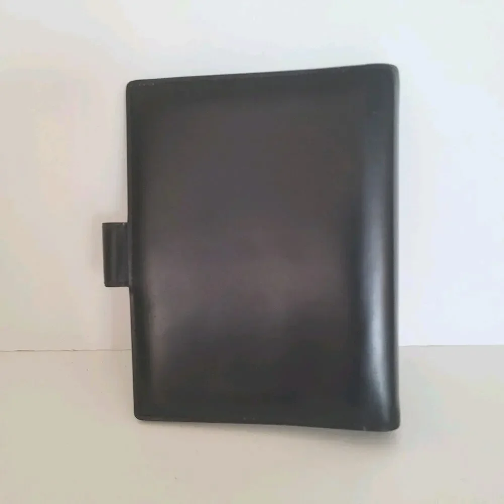 Cartier Black Leather Planner with Gold Panther Accent
